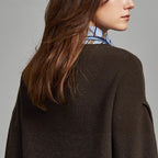 Splicing hollow wool knitted sweater