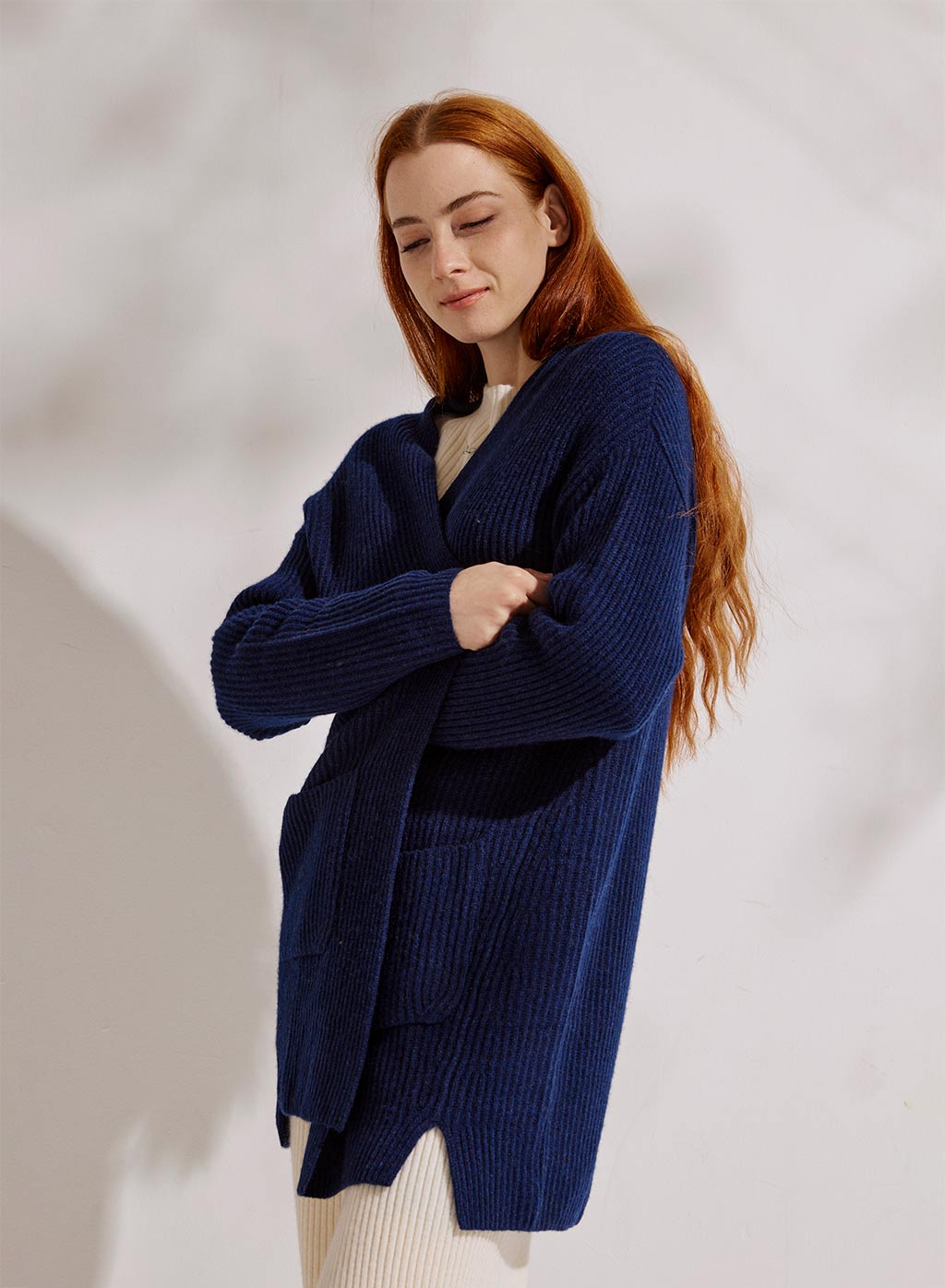 a woolen front open knitted jacket