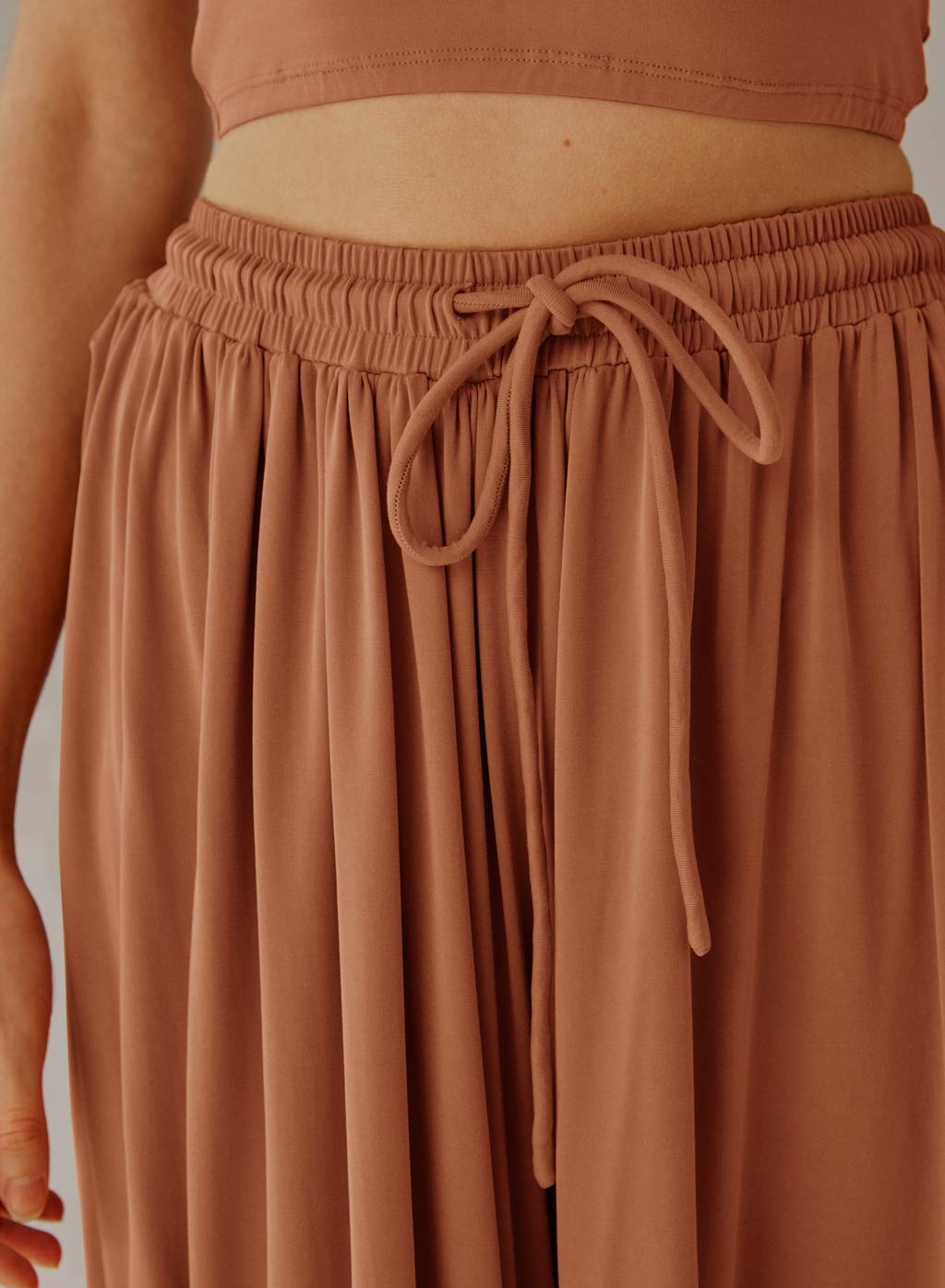 https://www.naploungewear.com/wp-content/uploads/2022/04/flowy-wide-leg-pants-orange-4.jpg